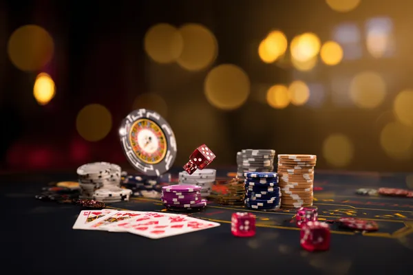 A confident dealer surrounded by casino chips inviting players to access their PAGASAS account, reflecting quick and easy login options.